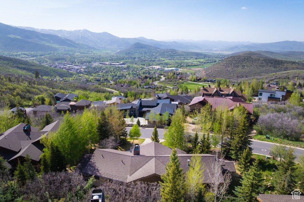 Aerial view of residential area with a mountainous background