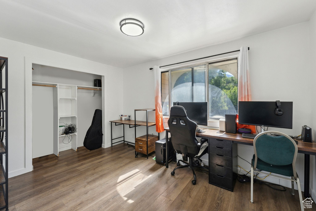 Office space featuring wood finished floors