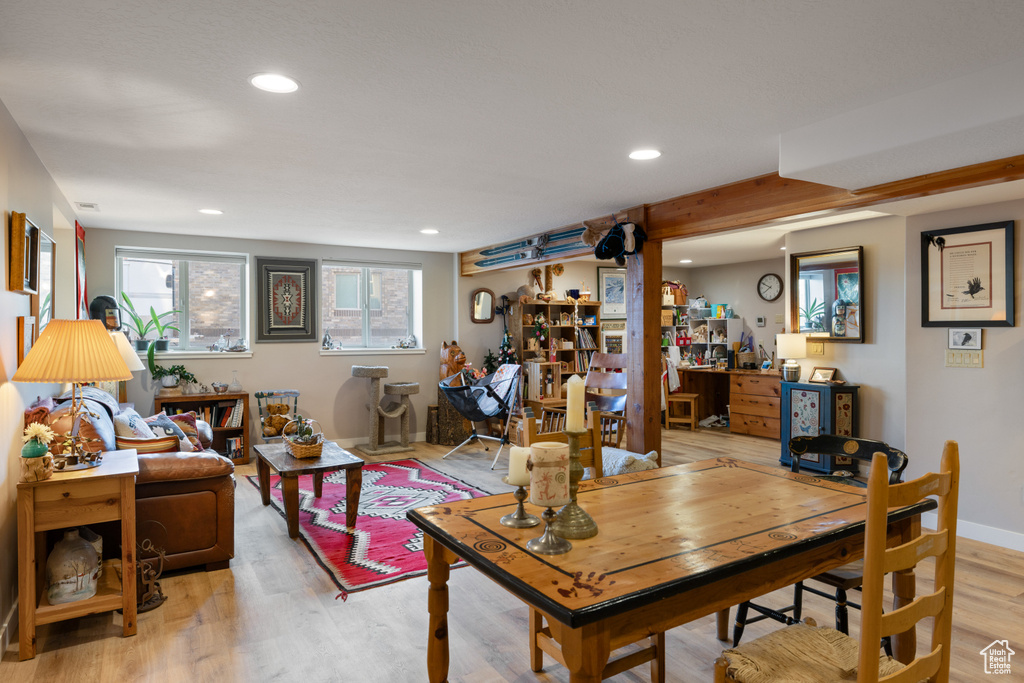 Living area featuring recessed lighting and light wood finished floors