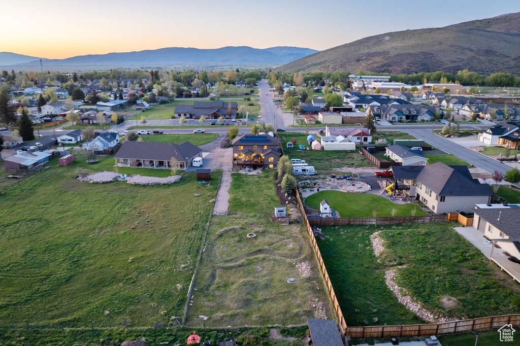 Aerial view at dusk of a mountain view and a residential view
