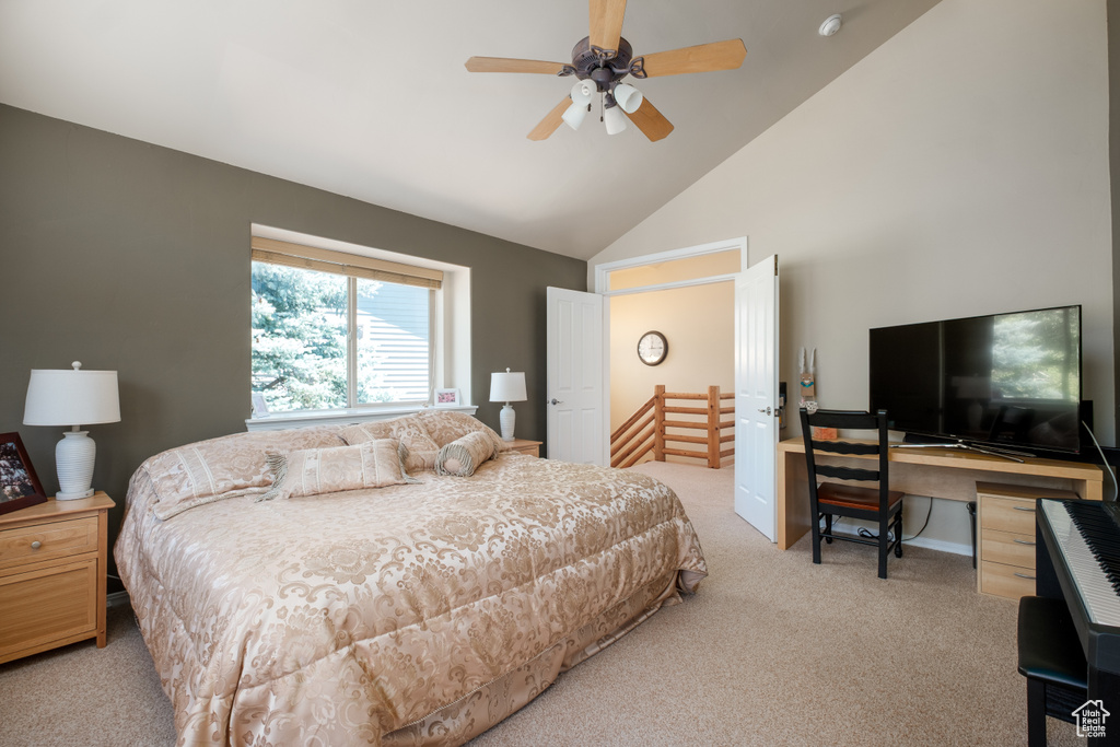 Bedroom featuring carpet, high vaulted ceiling, a desk, and ceiling fan