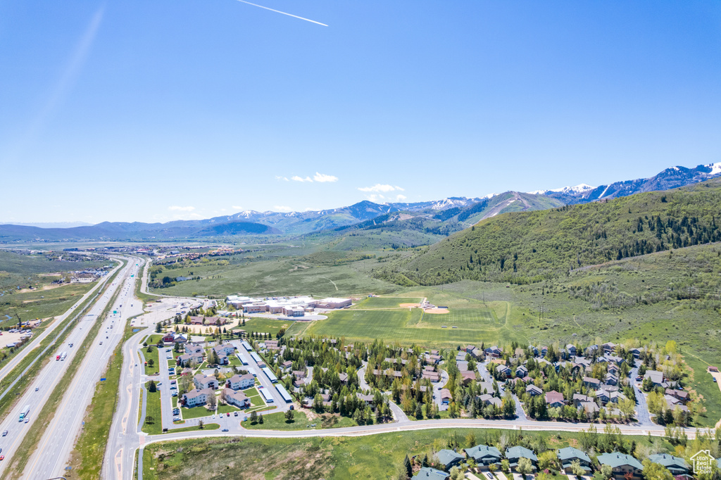 View of property location with mountains and a major roadway