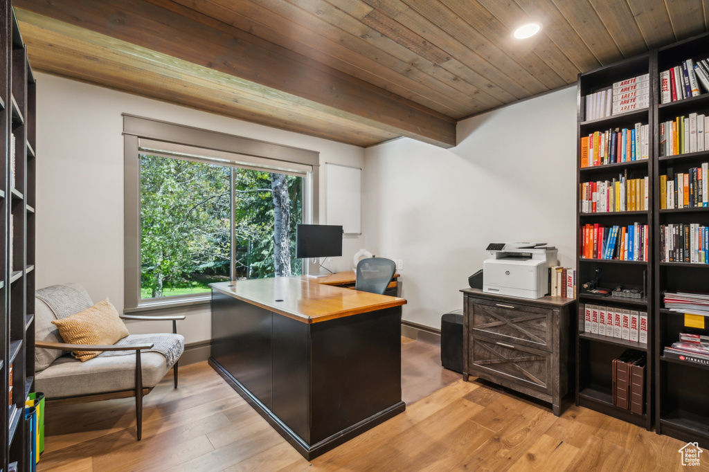 Office featuring light wood finished floors, wood ceiling, and recessed lighting