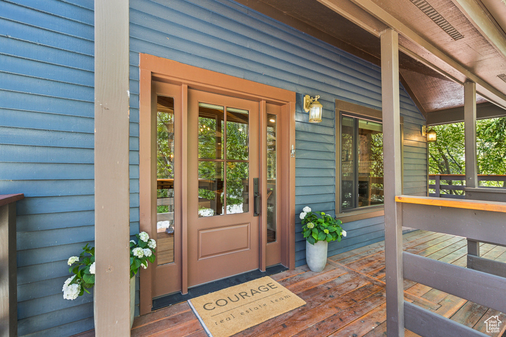 Entrance to property with a porch