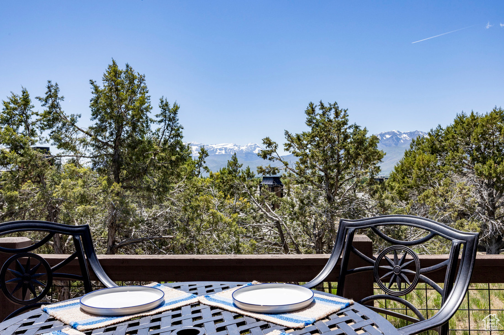 Wooden deck featuring a mountain view
