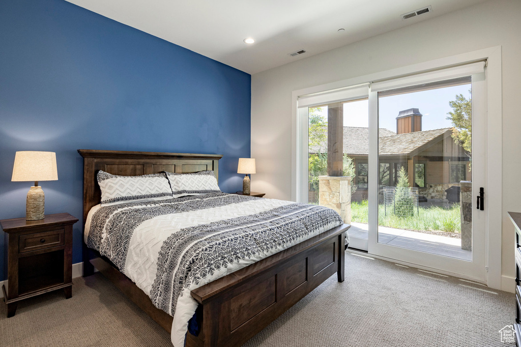 Carpeted bedroom with access to exterior and recessed lighting