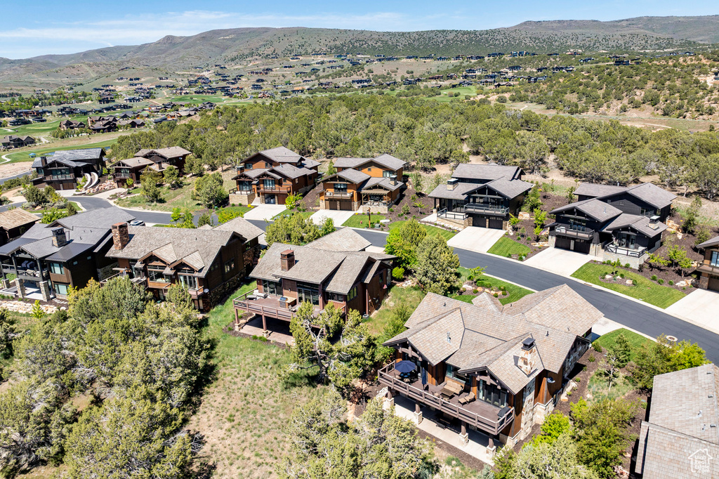 Aerial view of residential area featuring mountains