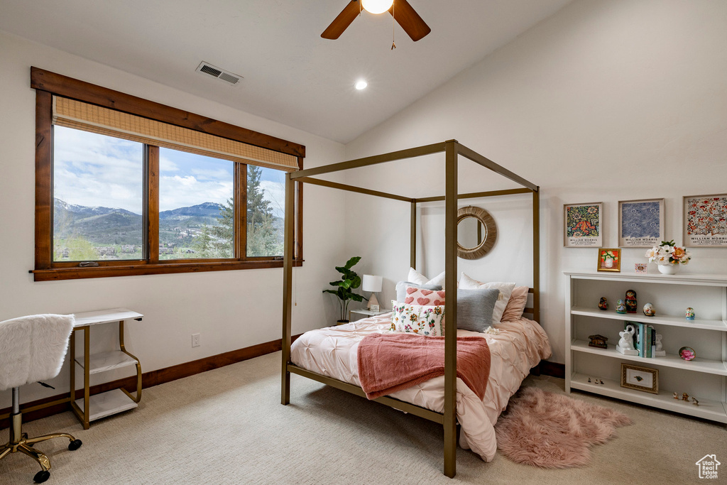 Bedroom with light carpet, vaulted ceiling, baseboards, a ceiling fan, and recessed lighting