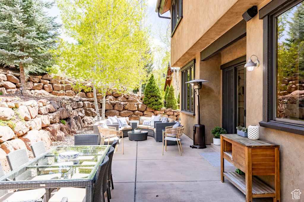 View of patio with outdoor lounge area