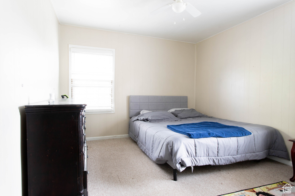 Bedroom featuring carpet flooring and ceiling fan