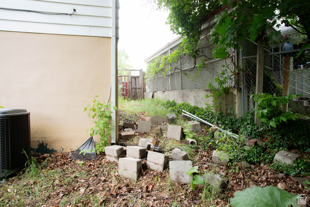 View of yard with central AC