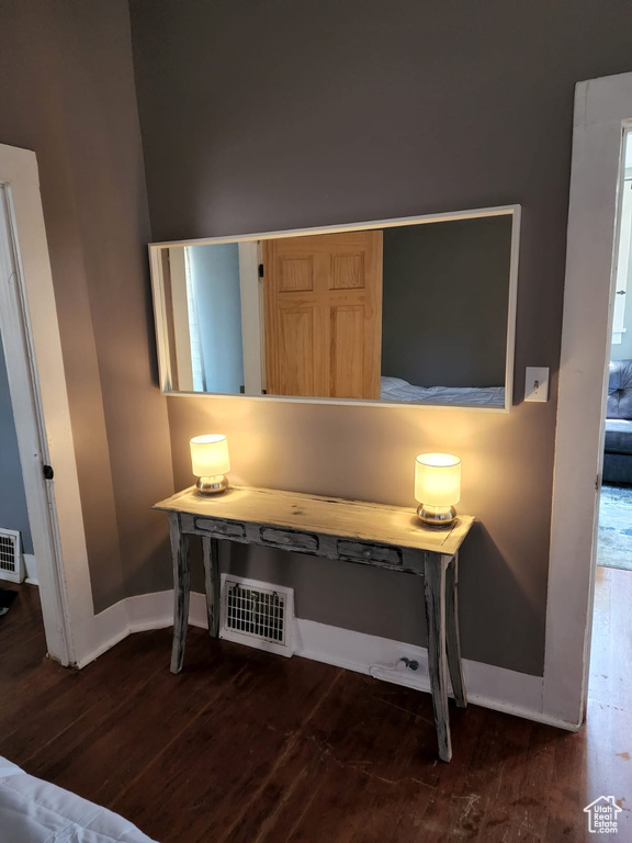 Detailed view of wood finished floors and baseboards