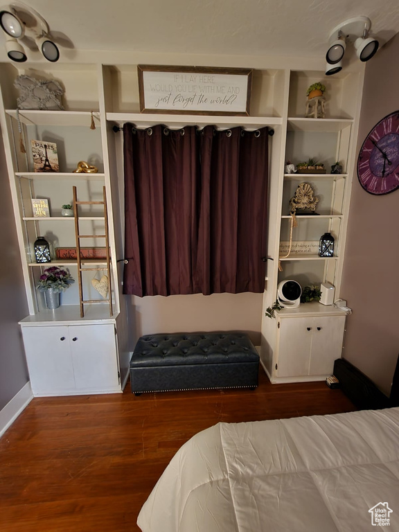 Bedroom featuring wood finished floors