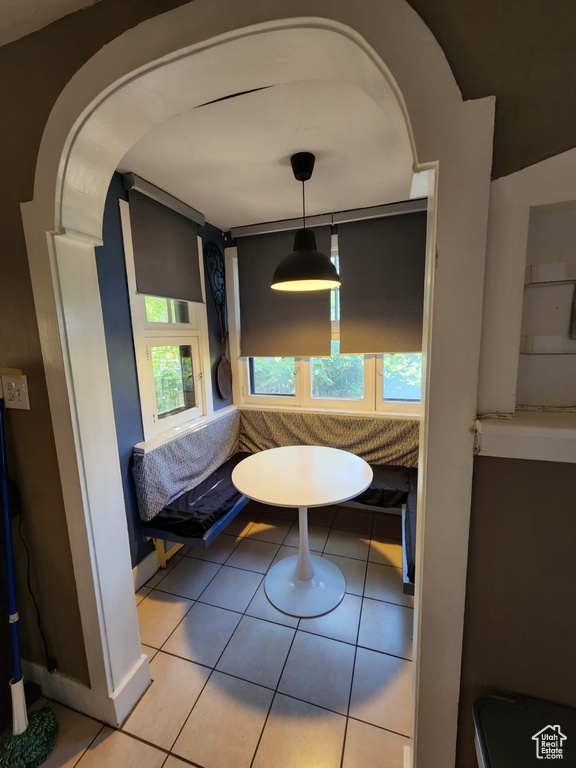 Bathroom featuring tile patterned floors and baseboards