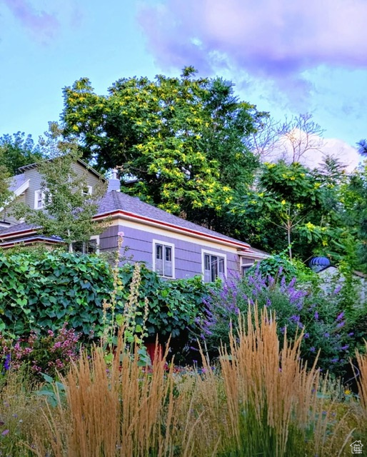 View of home's exterior featuring a chimney