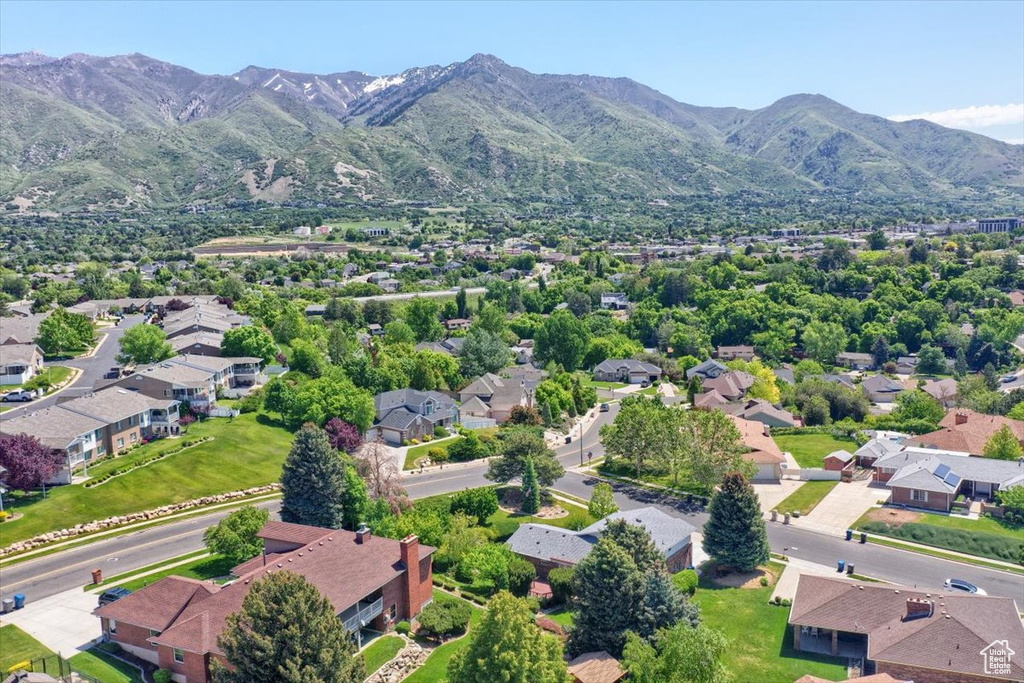 Aerial view of residential area featuring mountains