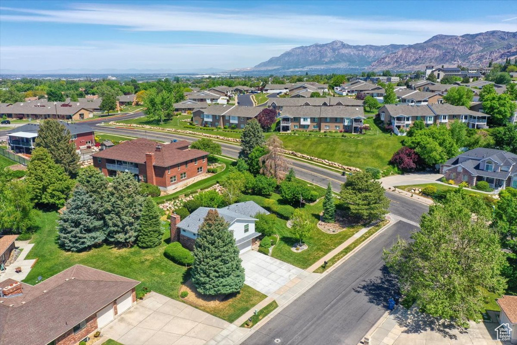 Aerial perspective of suburban area featuring mountains