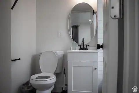 Bathroom with toilet and vanity