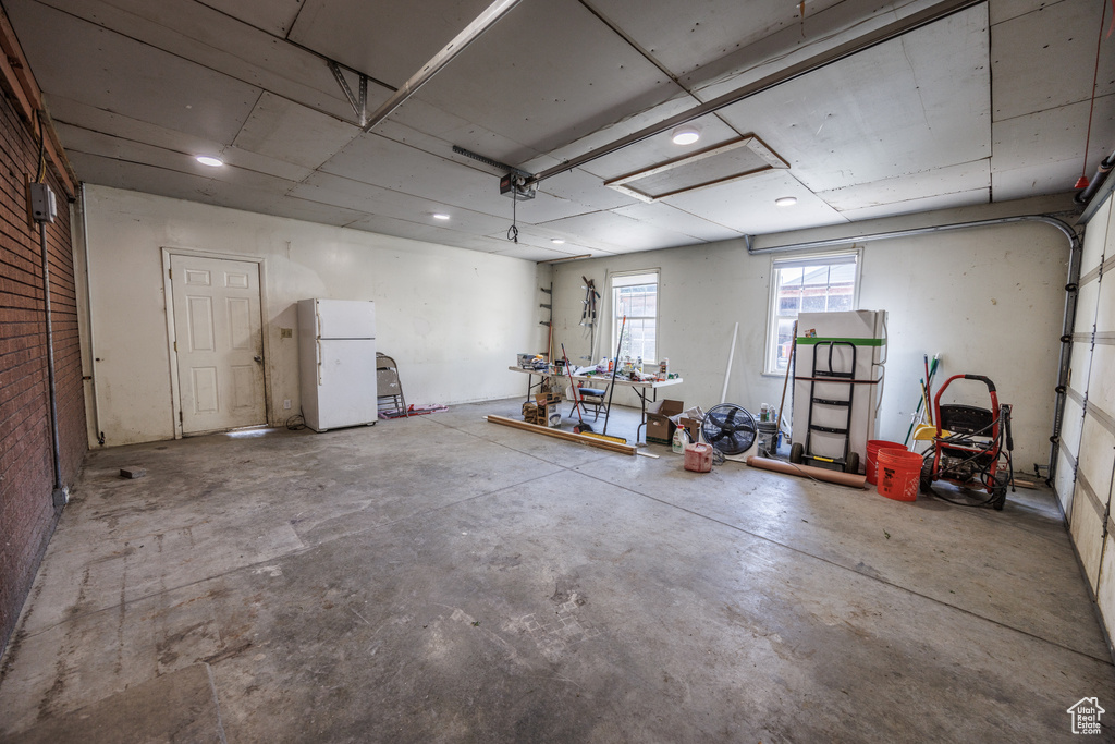 Garage with freestanding refrigerator