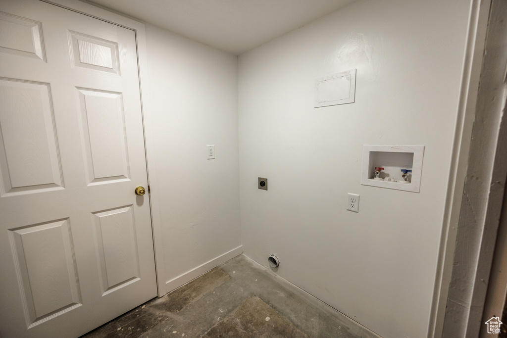 Laundry room featuring hookup for an electric dryer, washer hookup, and baseboards