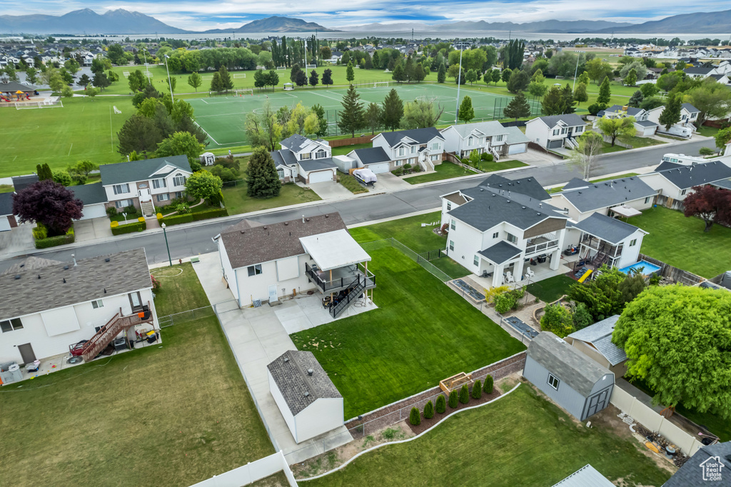 Aerial view of residential area featuring mountains