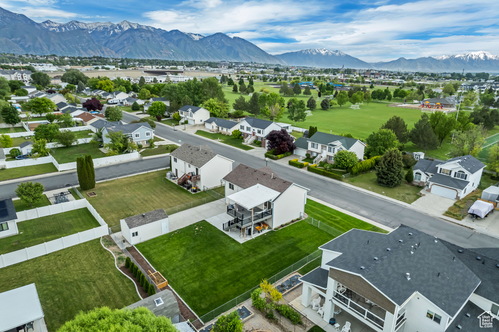 Aerial view of residential area featuring mountains