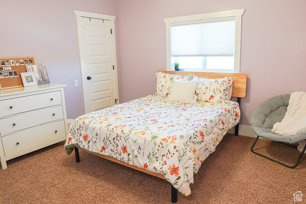 Bedroom featuring carpet flooring