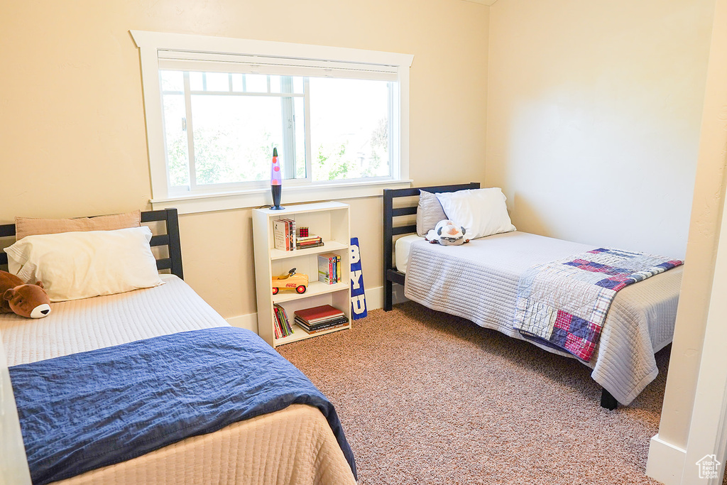 Bedroom with carpet flooring