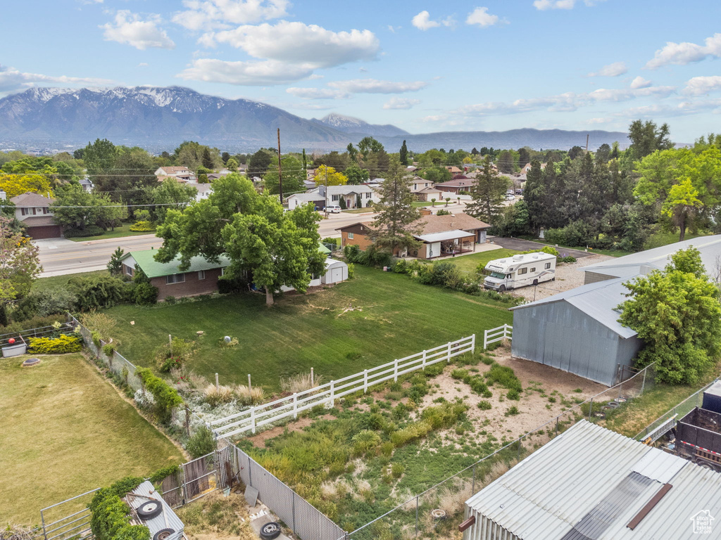 View of mountain backdrop with nearby suburban area