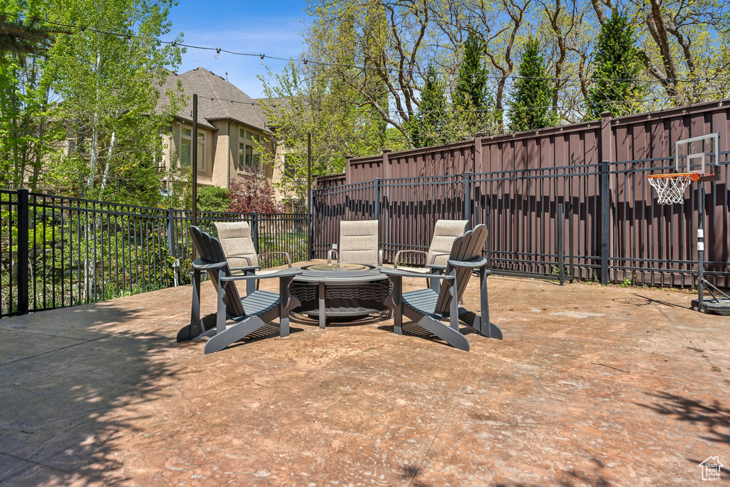 View of yard featuring a fire pit