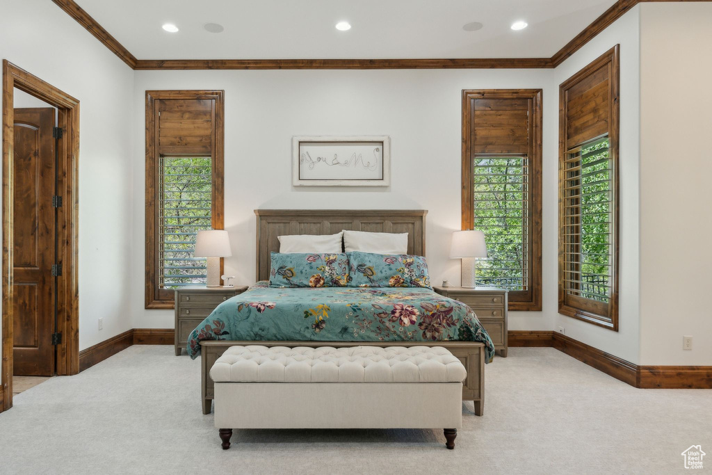 Bedroom with carpet, baseboards, ornamental molding, and recessed lighting