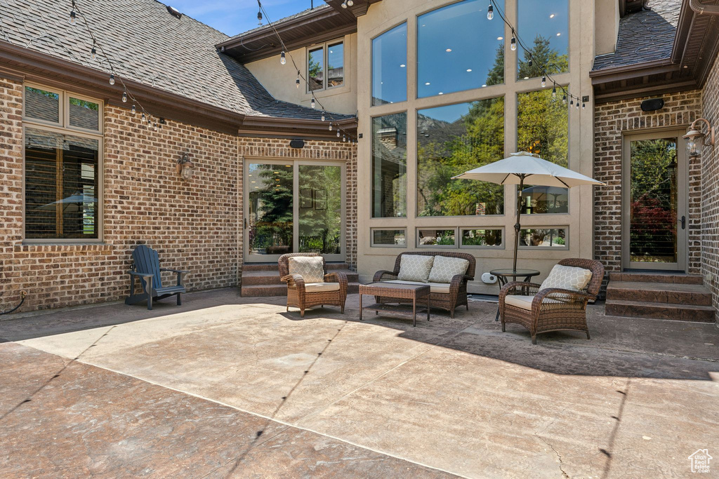 View of patio / terrace featuring an outdoor living space and entry steps