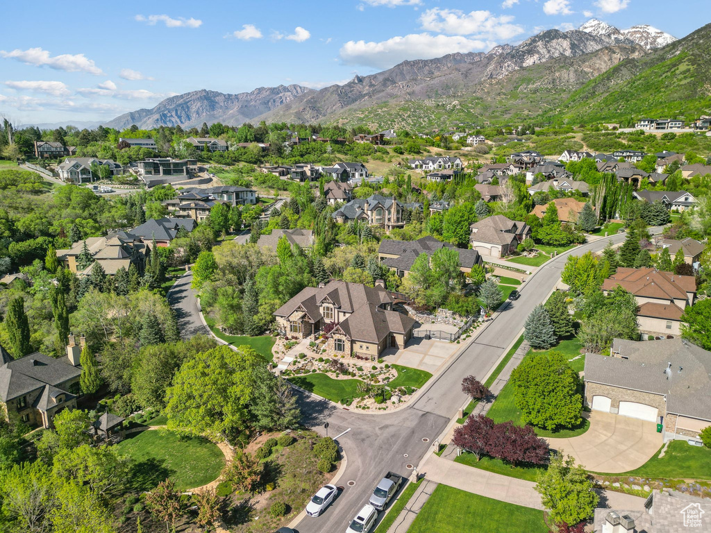 Aerial overview of property\\\'s location with nearby suburban area and mountains