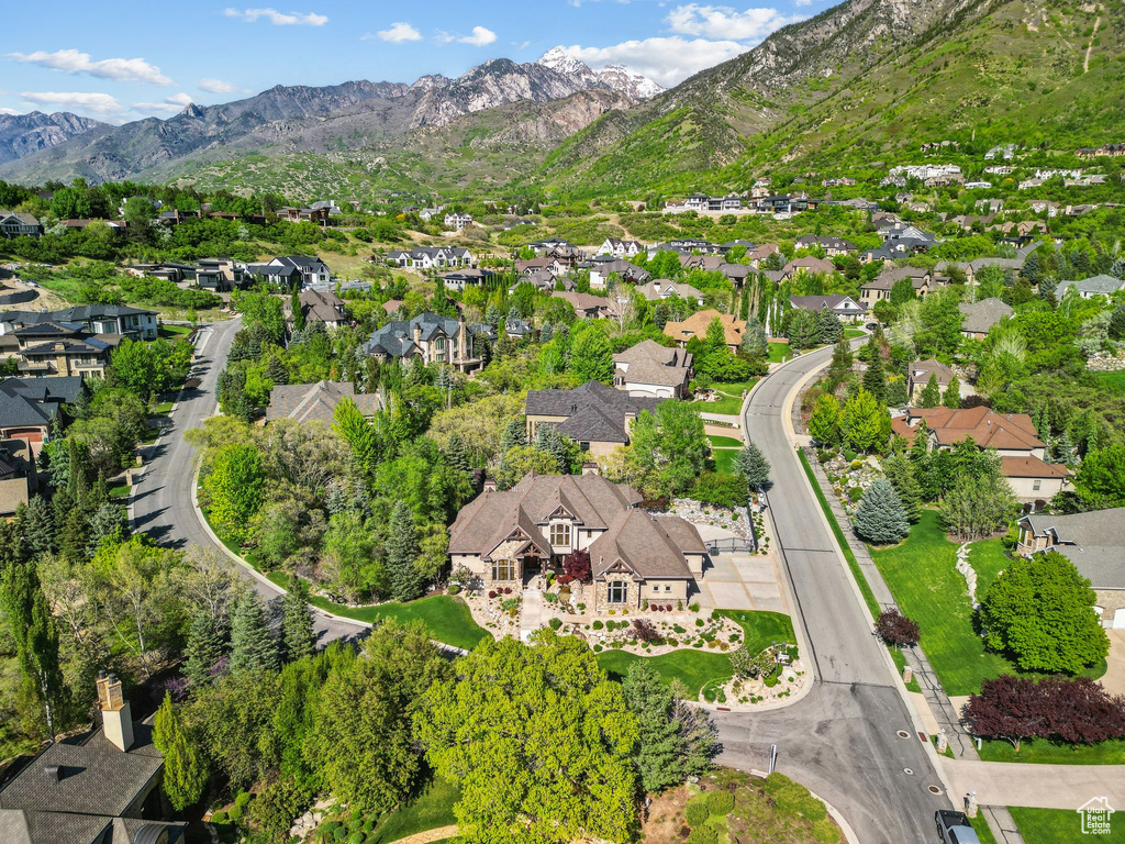 Aerial overview of property\\\'s location with mountains and nearby suburban area