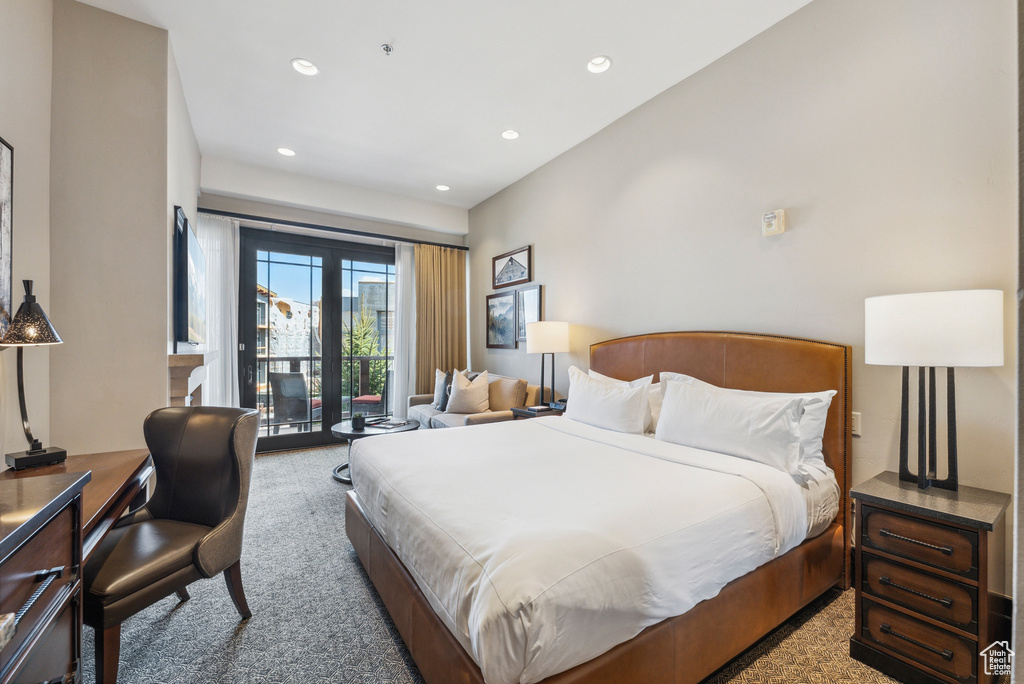 Carpeted bedroom with access to exterior and recessed lighting