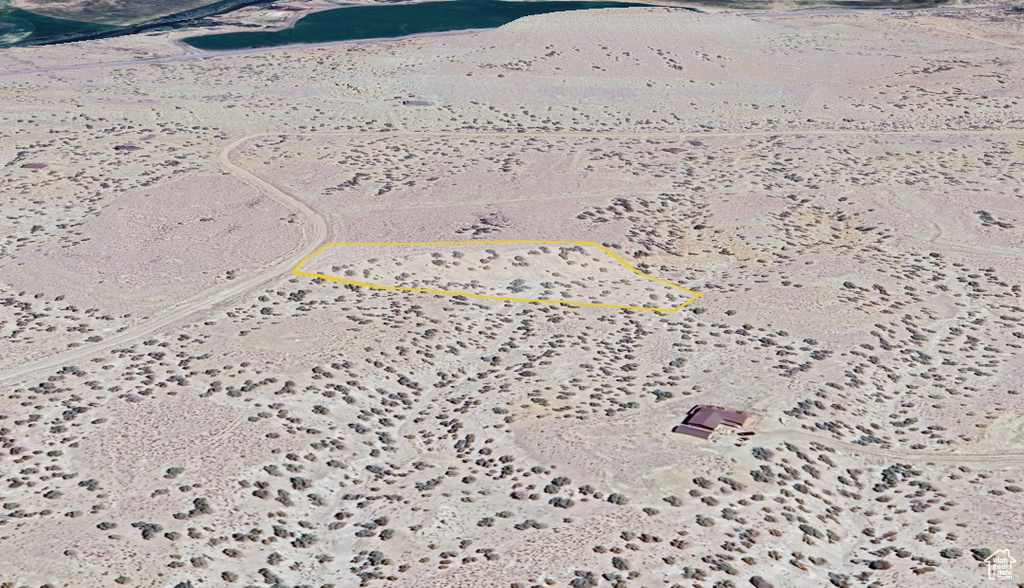 Aerial overview of property's location with property parcel outlined