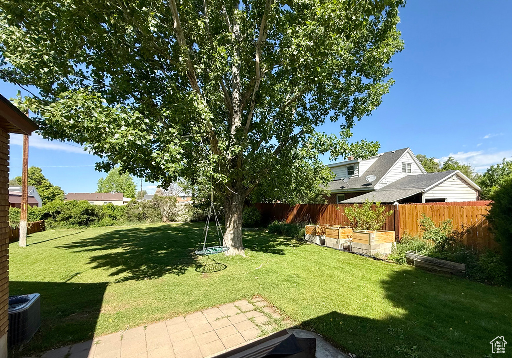 View of yard featuring a garden