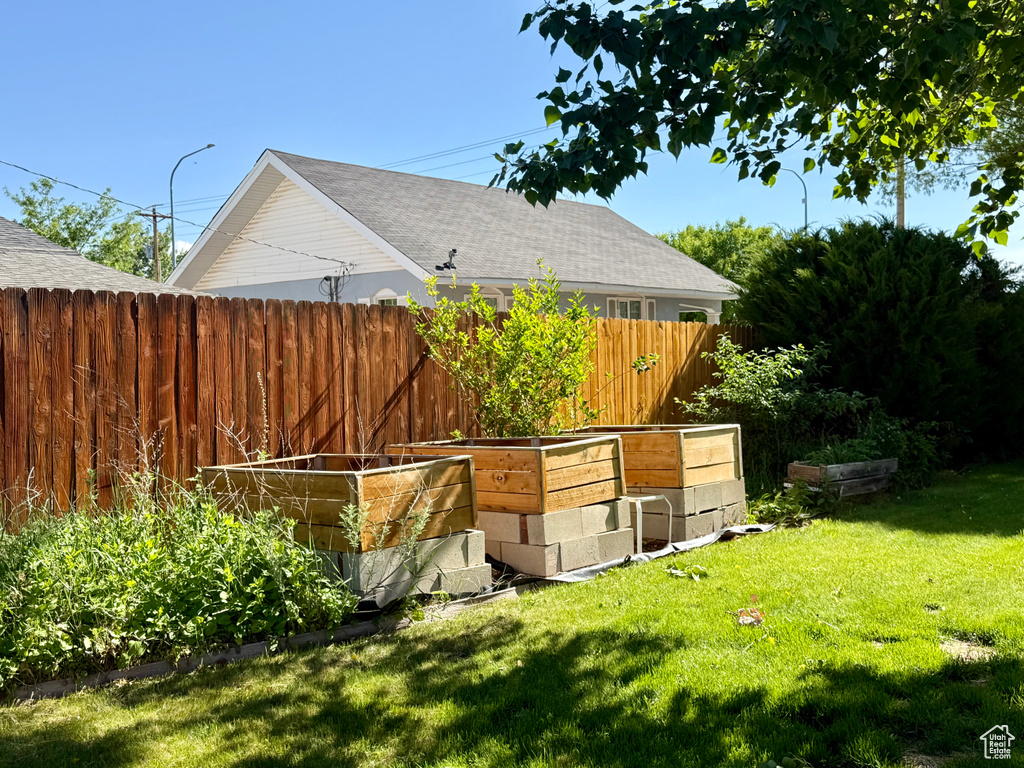 View of yard featuring a vegetable garden