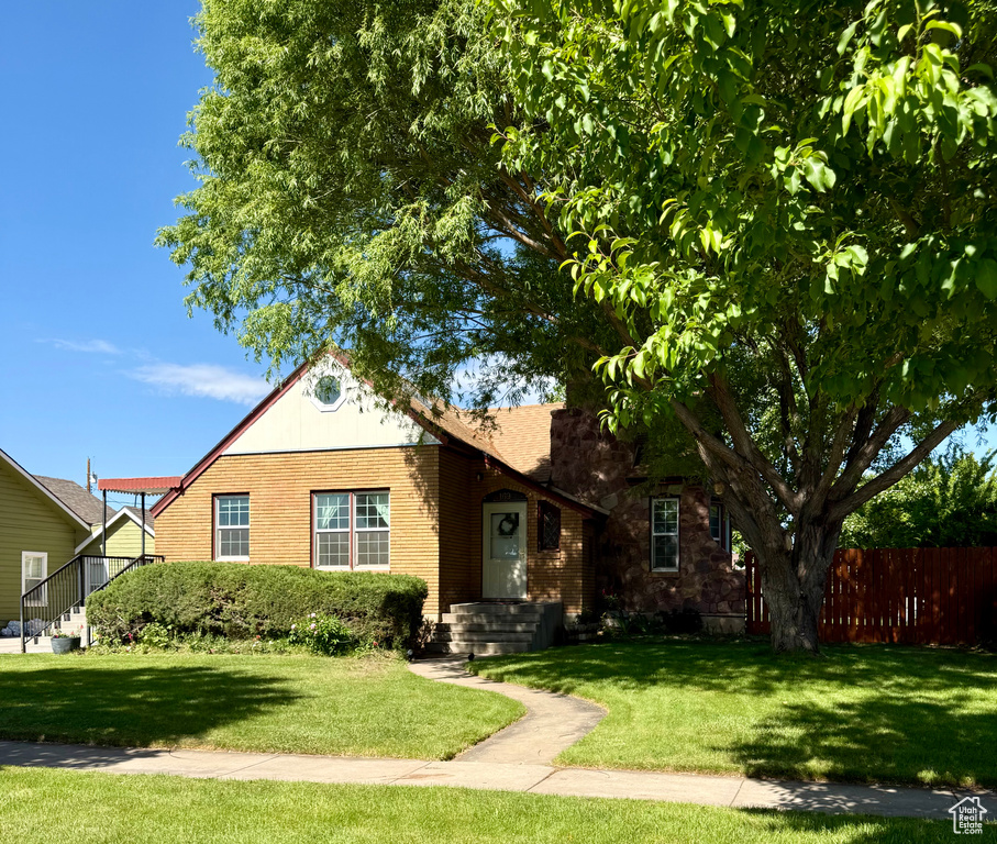 View of front of property featuring brick siding
