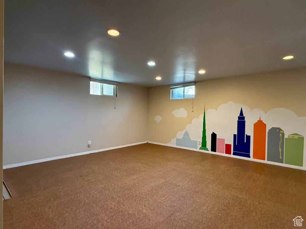 Below grade area featuring recessed lighting, carpet floors, and baseboards