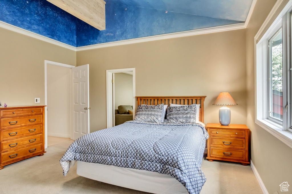 Bedroom with carpet flooring, high vaulted ceiling, and baseboards