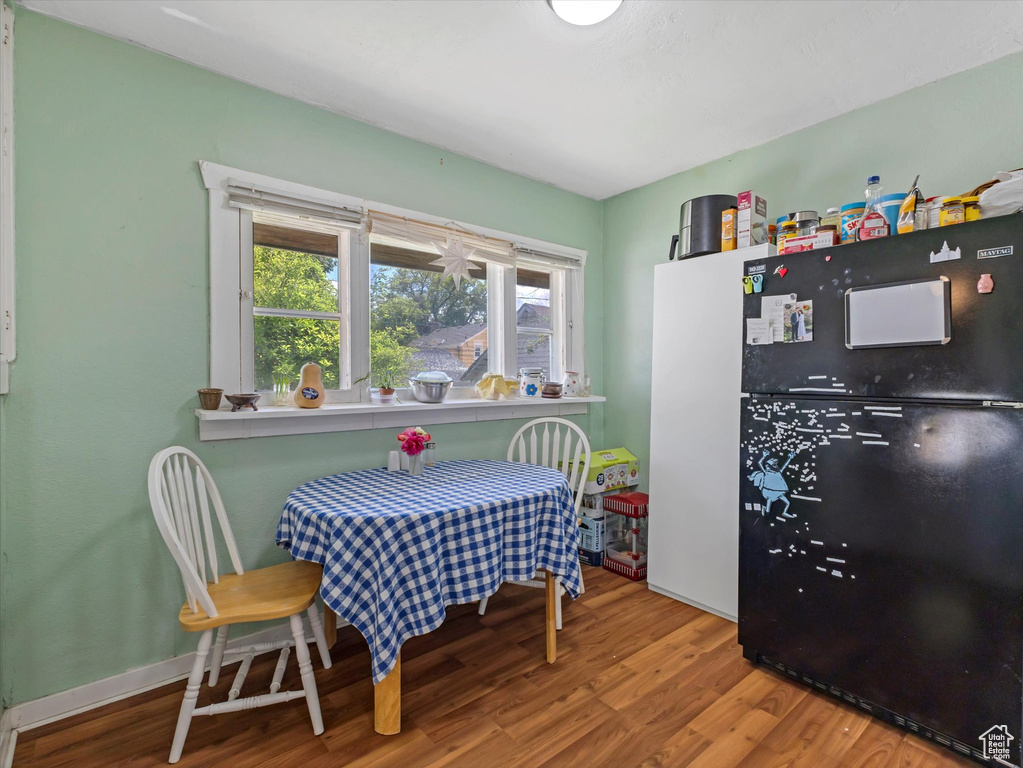 Dining room with wood finished floors