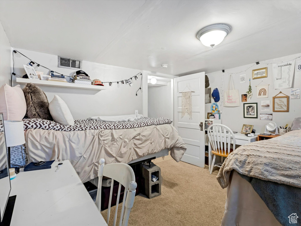 Bedroom featuring carpet
