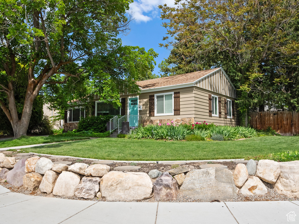 View of front of property with stone siding