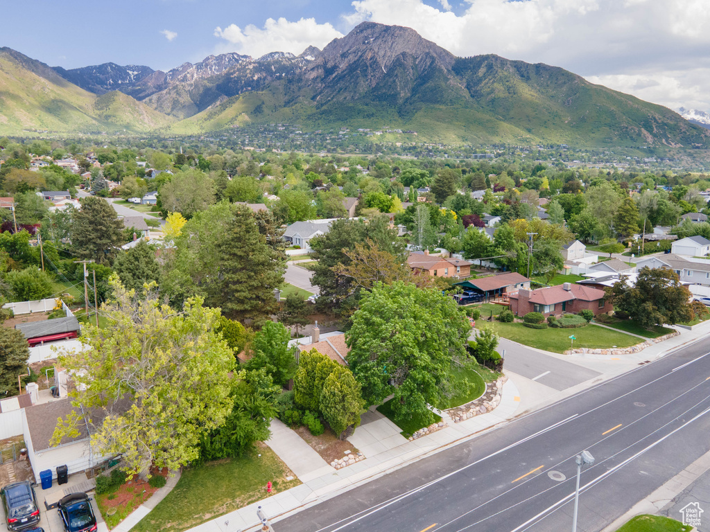 View of mountain backdrop featuring nearby suburban area