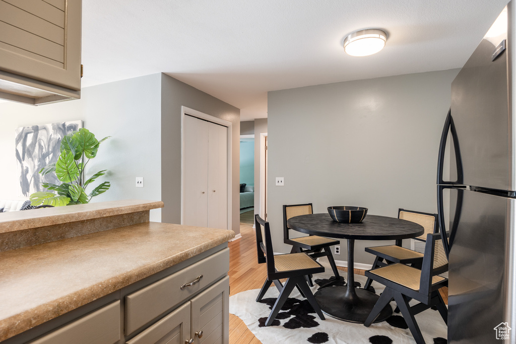 Dining area featuring light wood-style floors