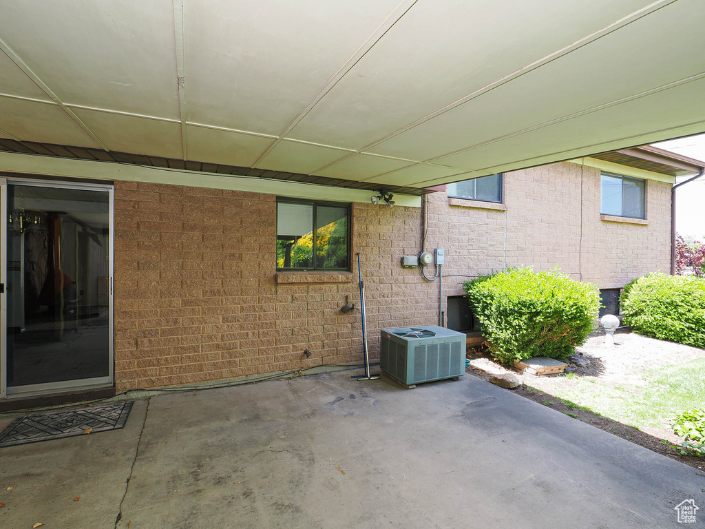 View of patio / terrace with central AC unit
