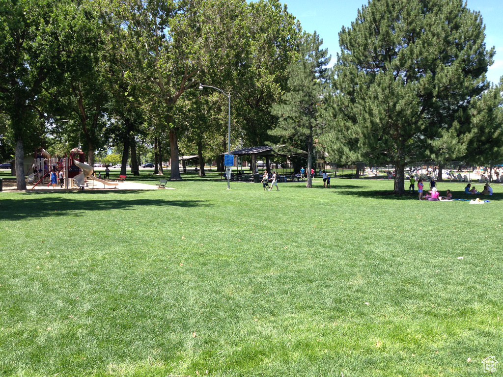 View of property's community with a gazebo and a yard