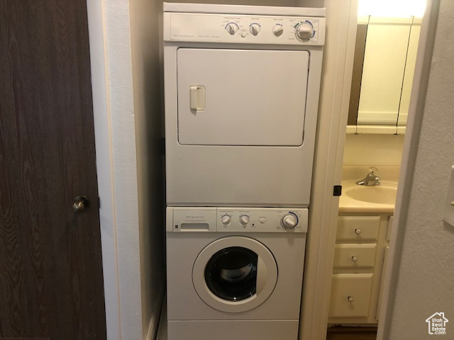 Washroom with stacked washer / dryer