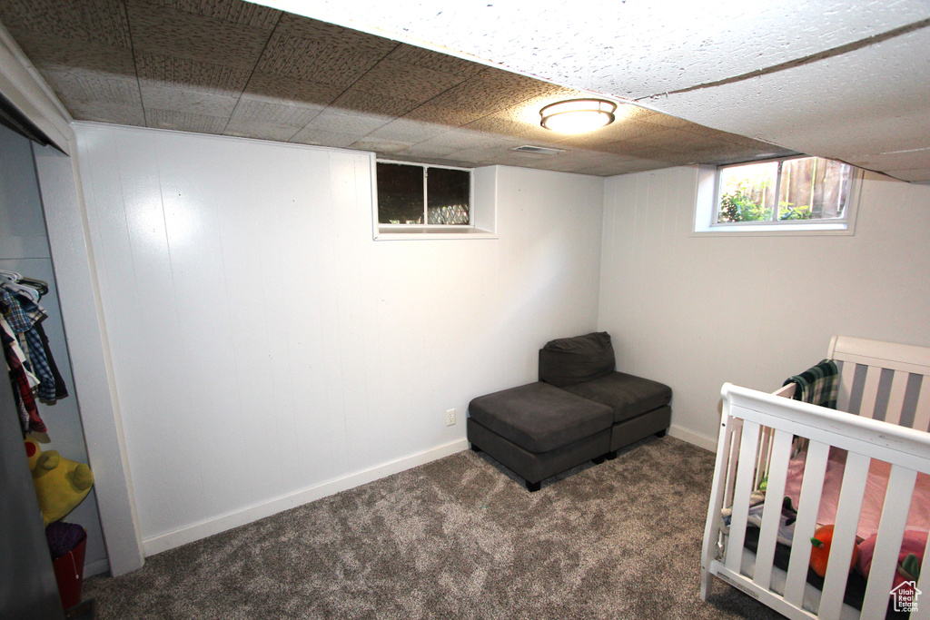 Bedroom with carpet and baseboards